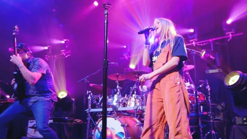 Chuck Morris’ Daughter Amelia Morris Makes Emotional Appearance With Lotus In Denver