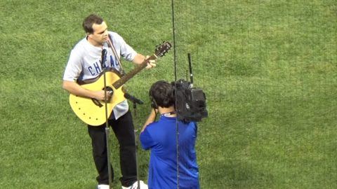 Watch Umphrey's McGee's Brendan Bayliss Perform Inside Wrigley Field's  Iconic Scoreboard