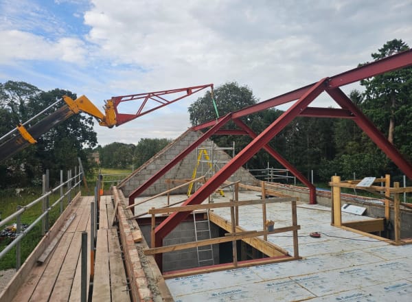 Steel Trusses Lifted by Crane