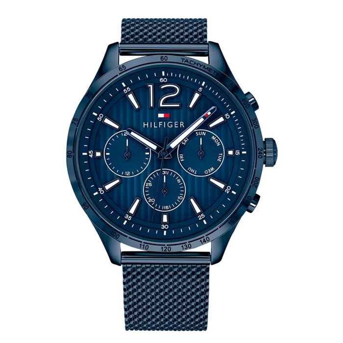 Stylish blue Tommy Hilfiger chronograph watch with mesh band, featuring date and day indicators, and bold hour markers.