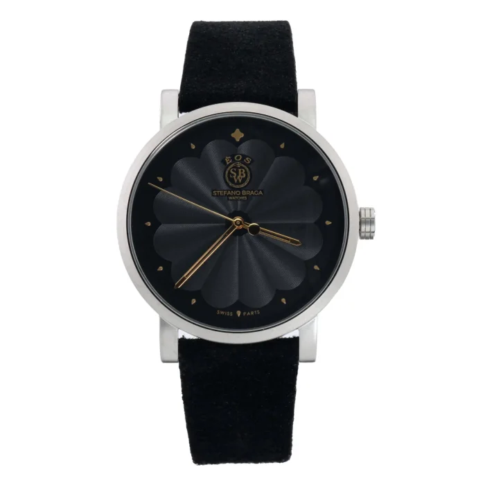 STEFANO BRAGA EOS1000B-NR-05KNR Sleek black watch by Stefano Braga, featuring a textured round face, gold accents, and a black suede strap. Elegant and modern design.
