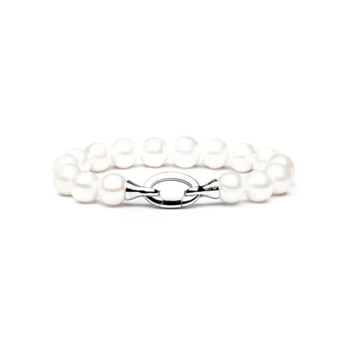 Elegant pearl bracelet with a silver clasp, featuring lustrous white pearls in varying sizes arranged in a delicate design.