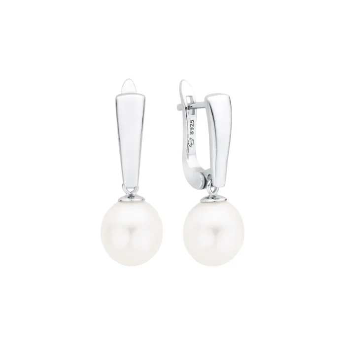 Elegant silver earrings featuring lustrous white pearls, adding a classic touch to any outfit
