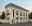 Multi-tenant retail building with arched bays for sportswear brands