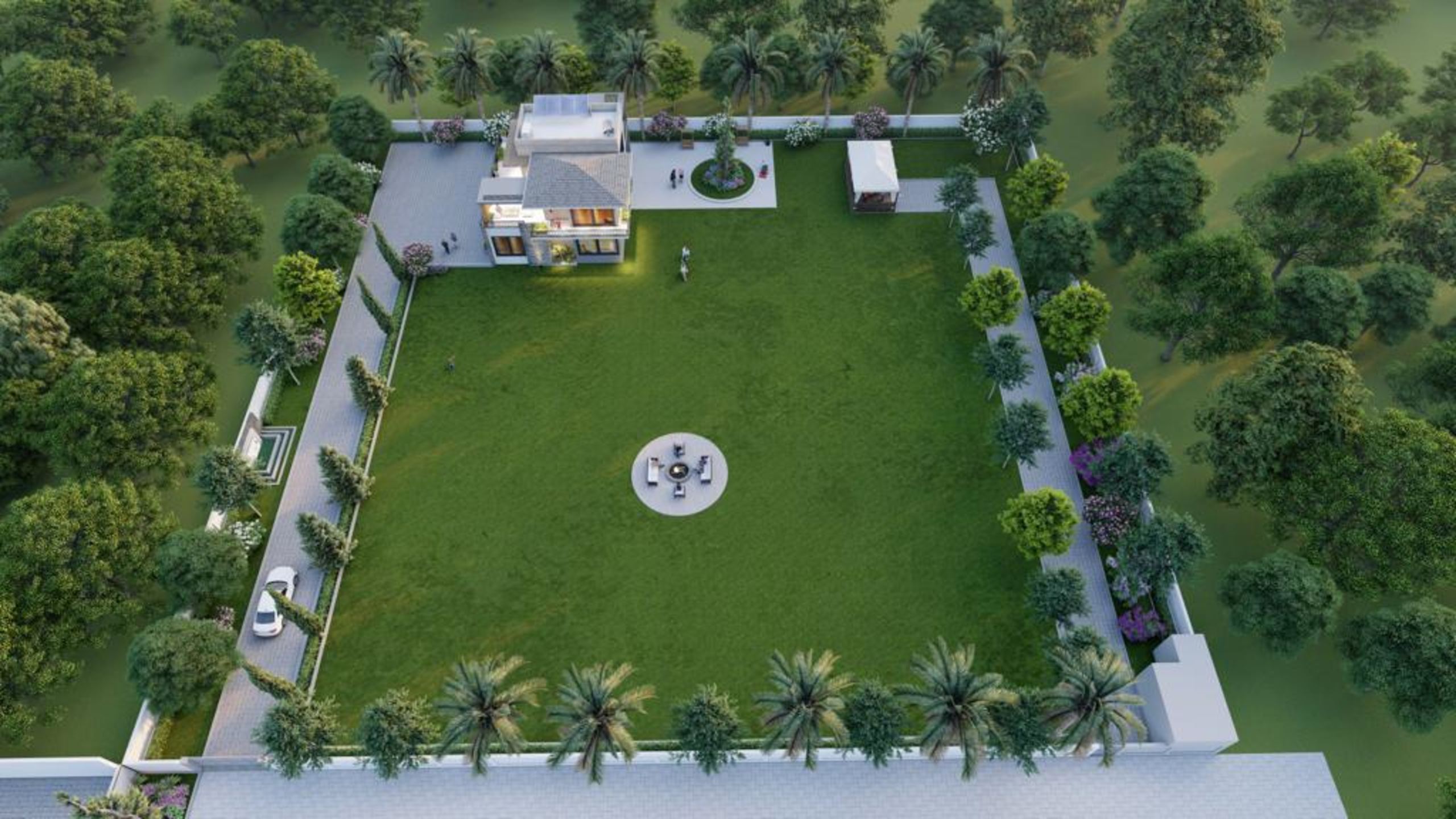 Overhead view of an estate landscape with palm avenue and seating circle