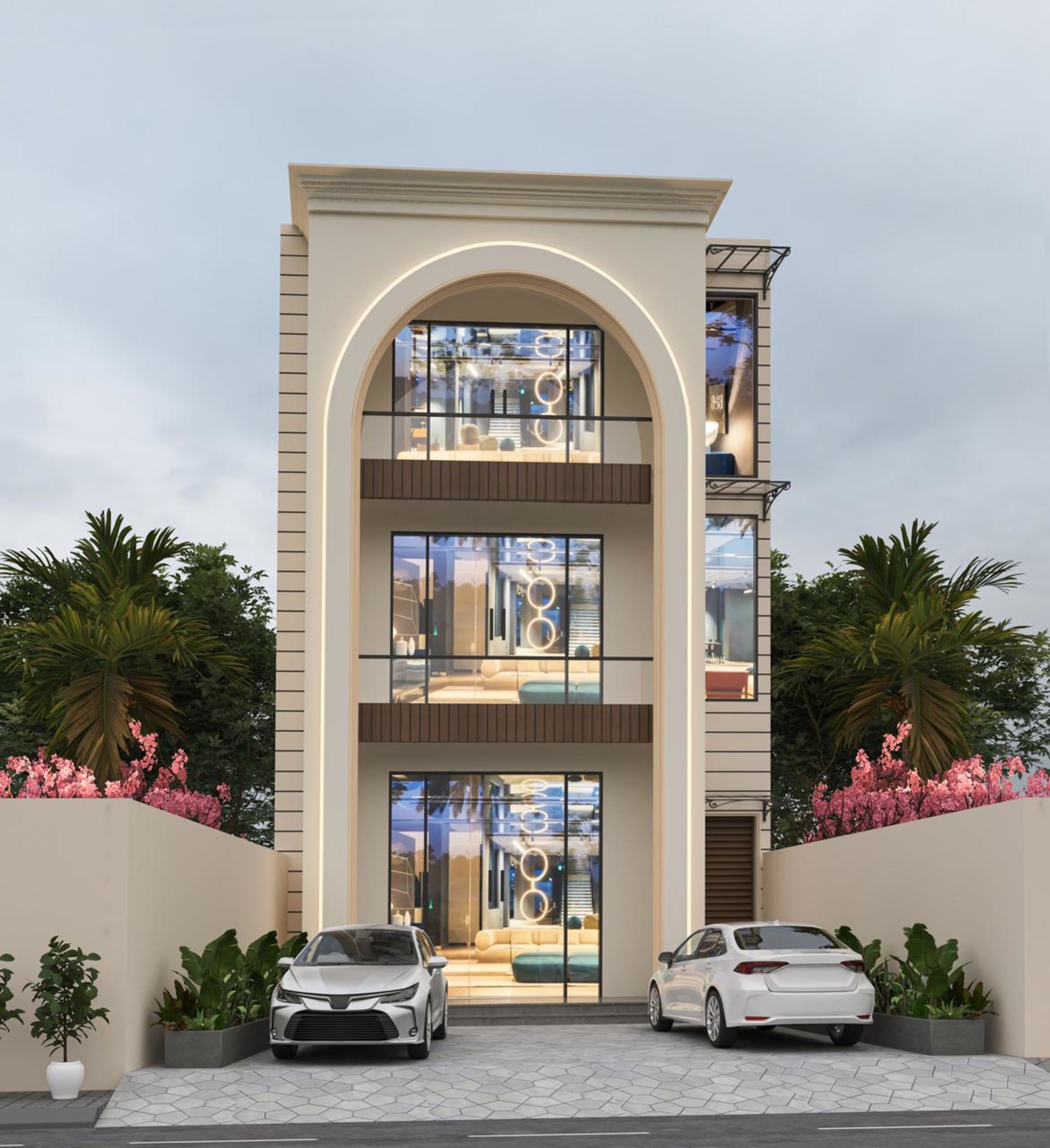 Three-storey showroom with a full-height arched glazed front at dusk