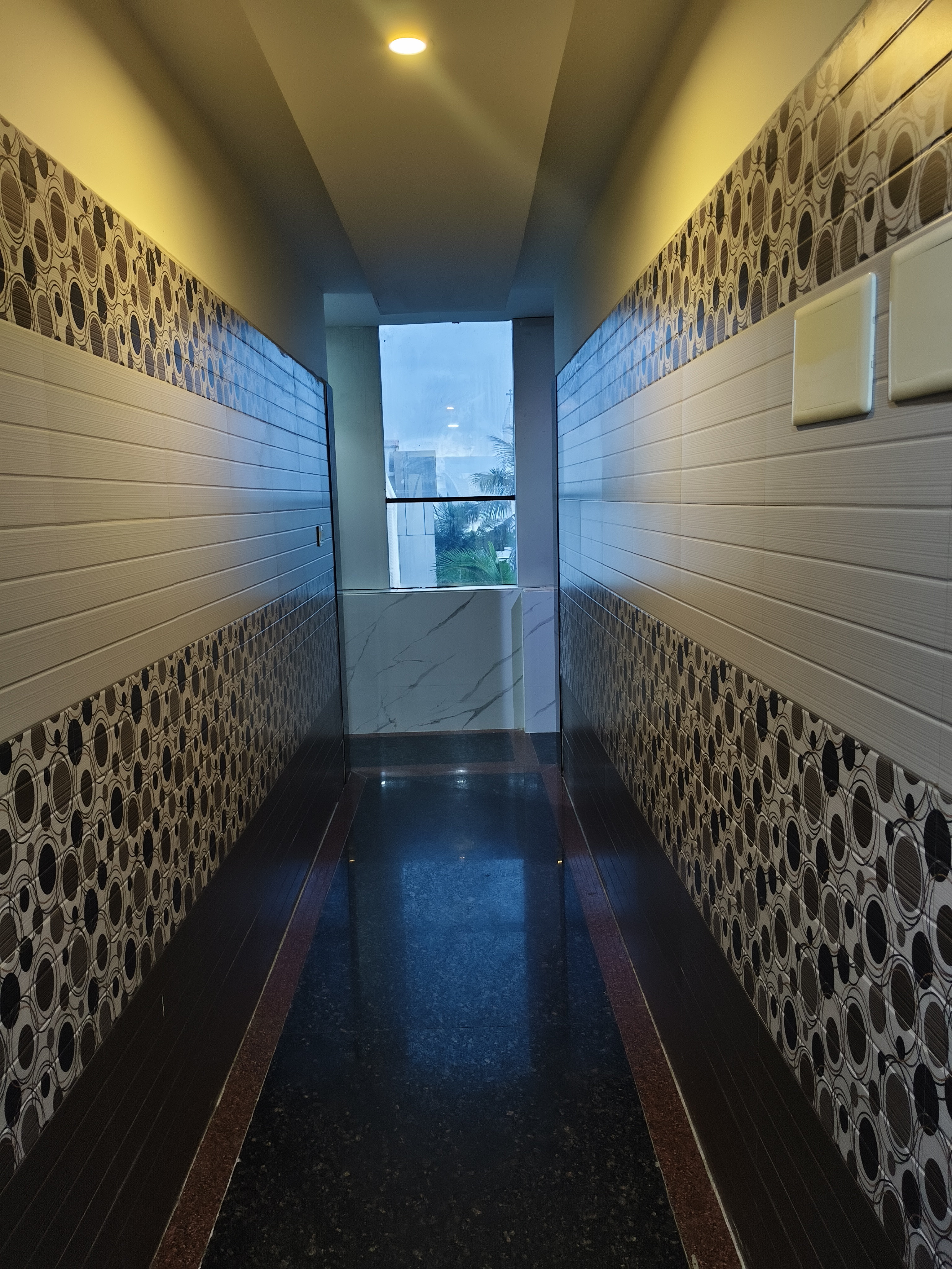 Stylishly patterned hallway corridor at Emirates Inn