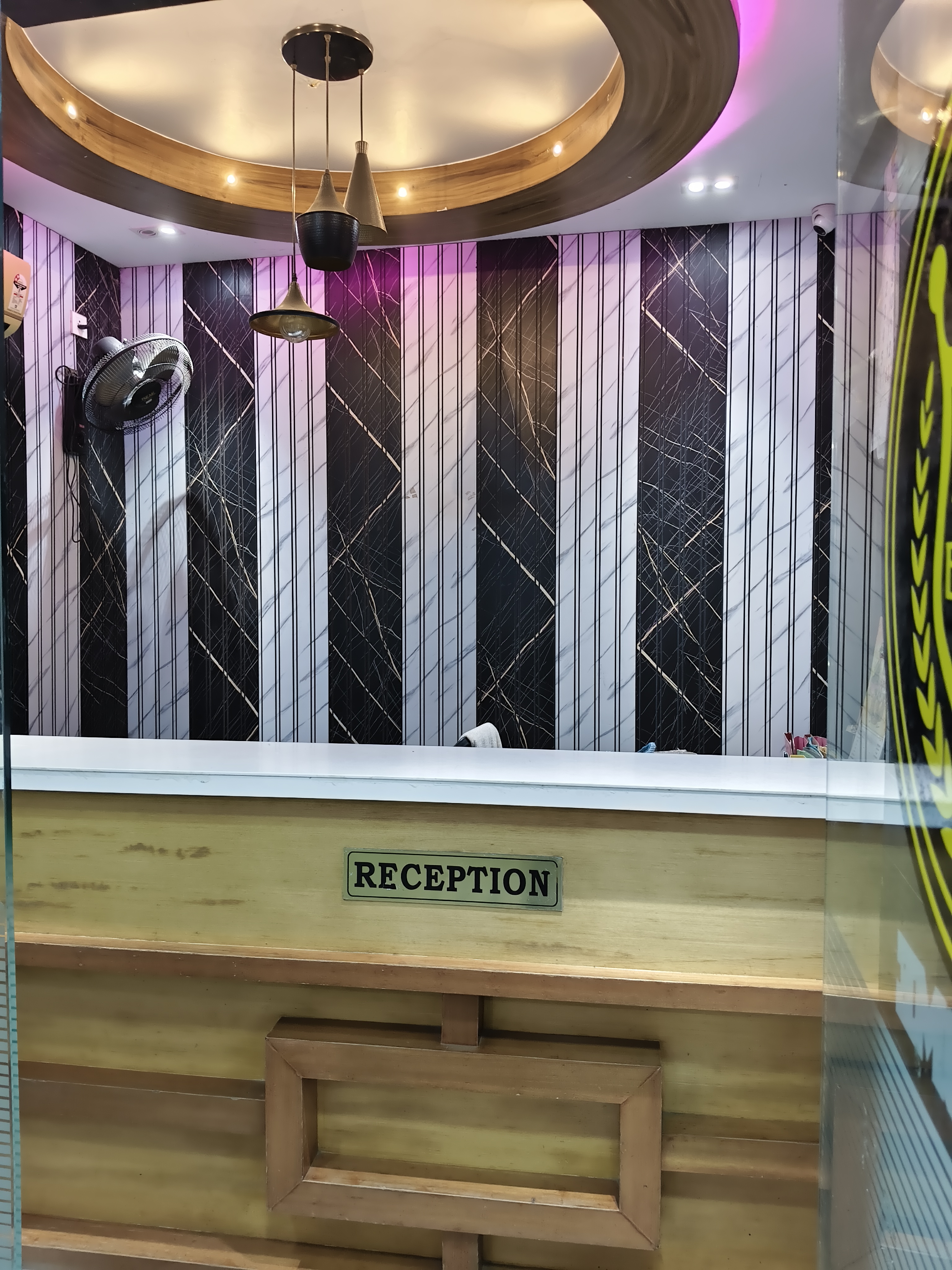 Welcoming reception and check-in desk at Emirates Inn