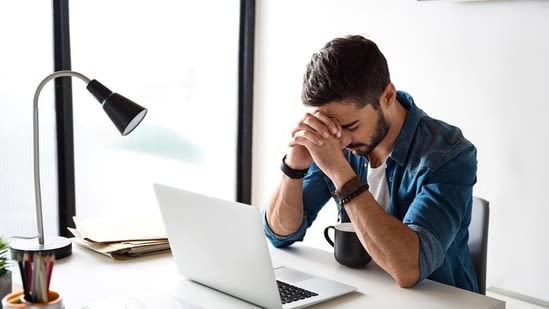 Is your desk job giving you 'sitting disease'? Neurosurgeon explains this back pain and 9 tools to fix it