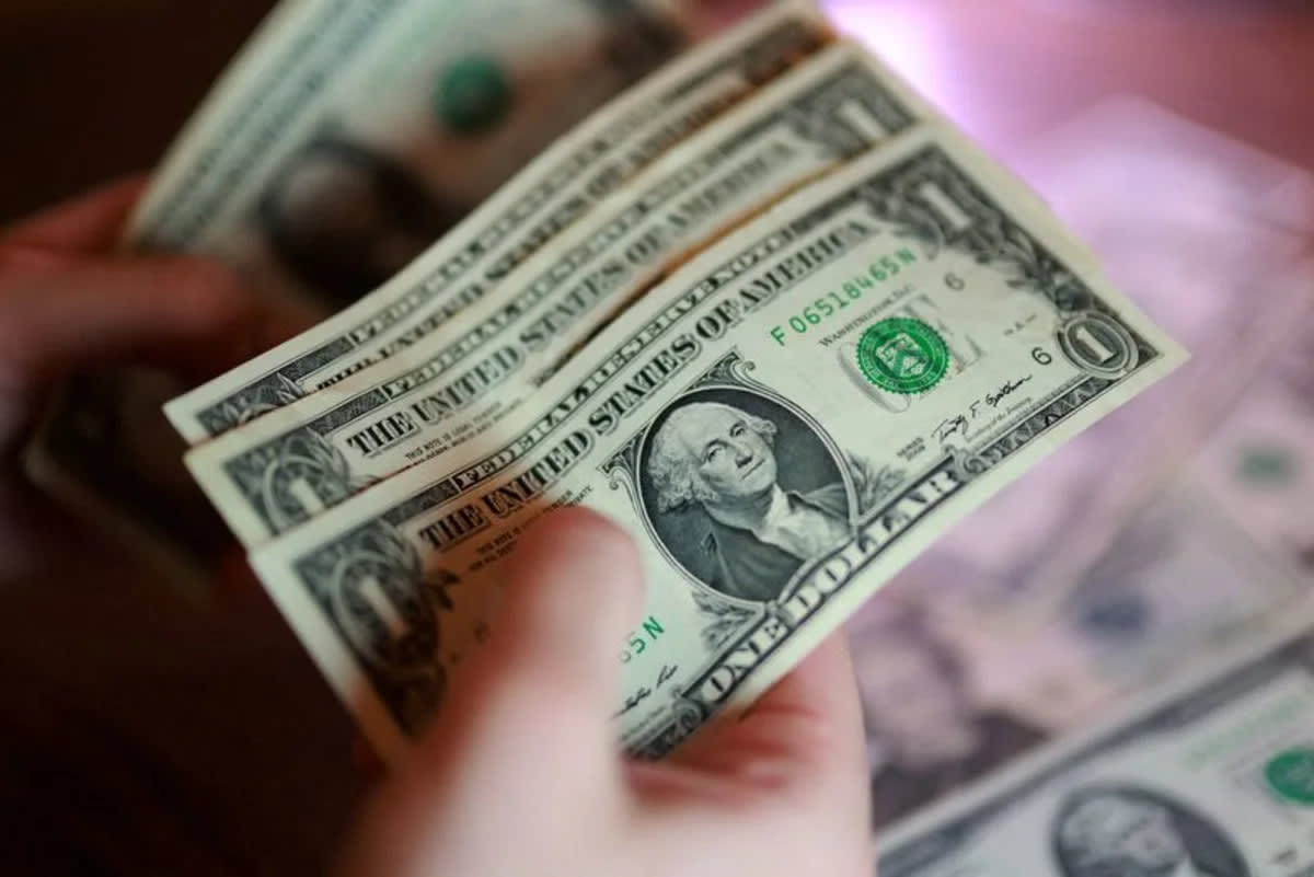 Dollar wavers amid renewed Iran attacks, yen slides on pensions doubts