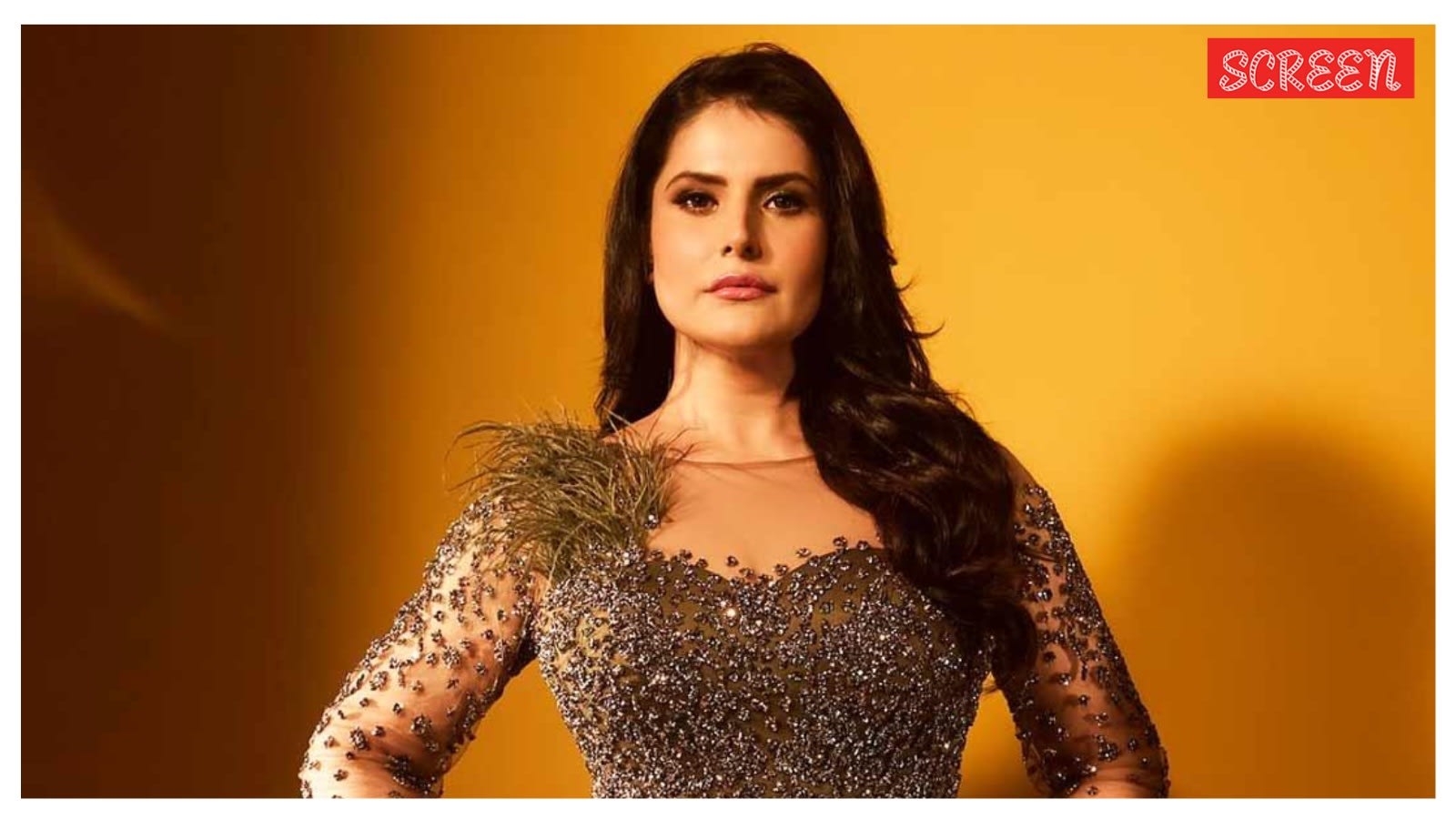 Zareen Khan shuts down paparazzi as they ask her to try a outfit in front of them. Watch