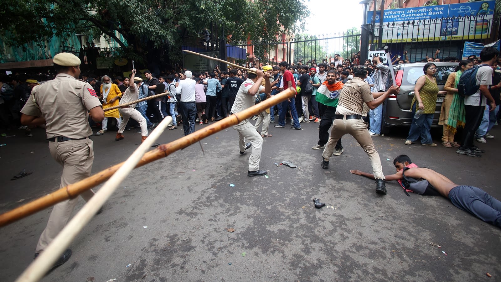 Protesters storm heart of Delhi, police use lathis and tear gas to stop march