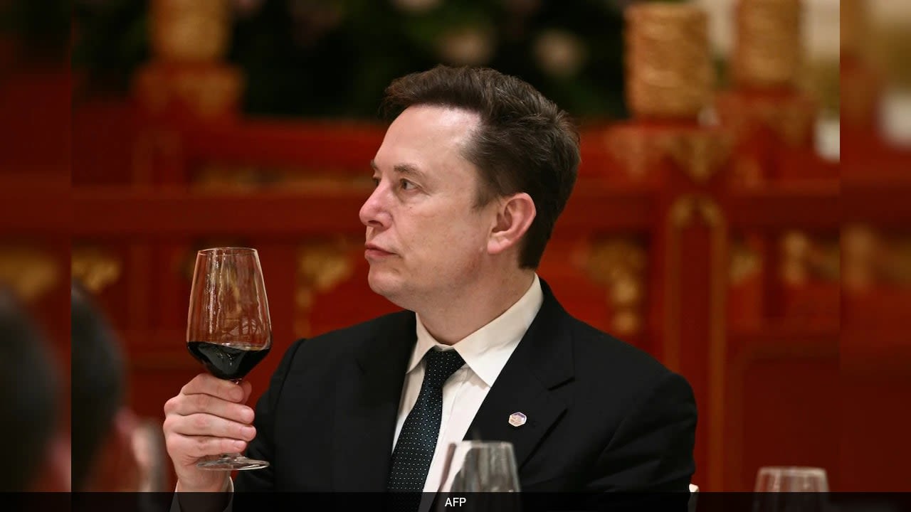 Tesla Profit Falls As Musk Ramps Up Spending On AI, Robotaxis