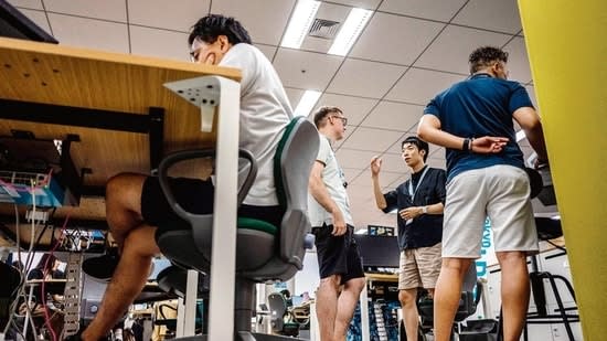 Ditch suits for shorts in office, Tokyo urges men