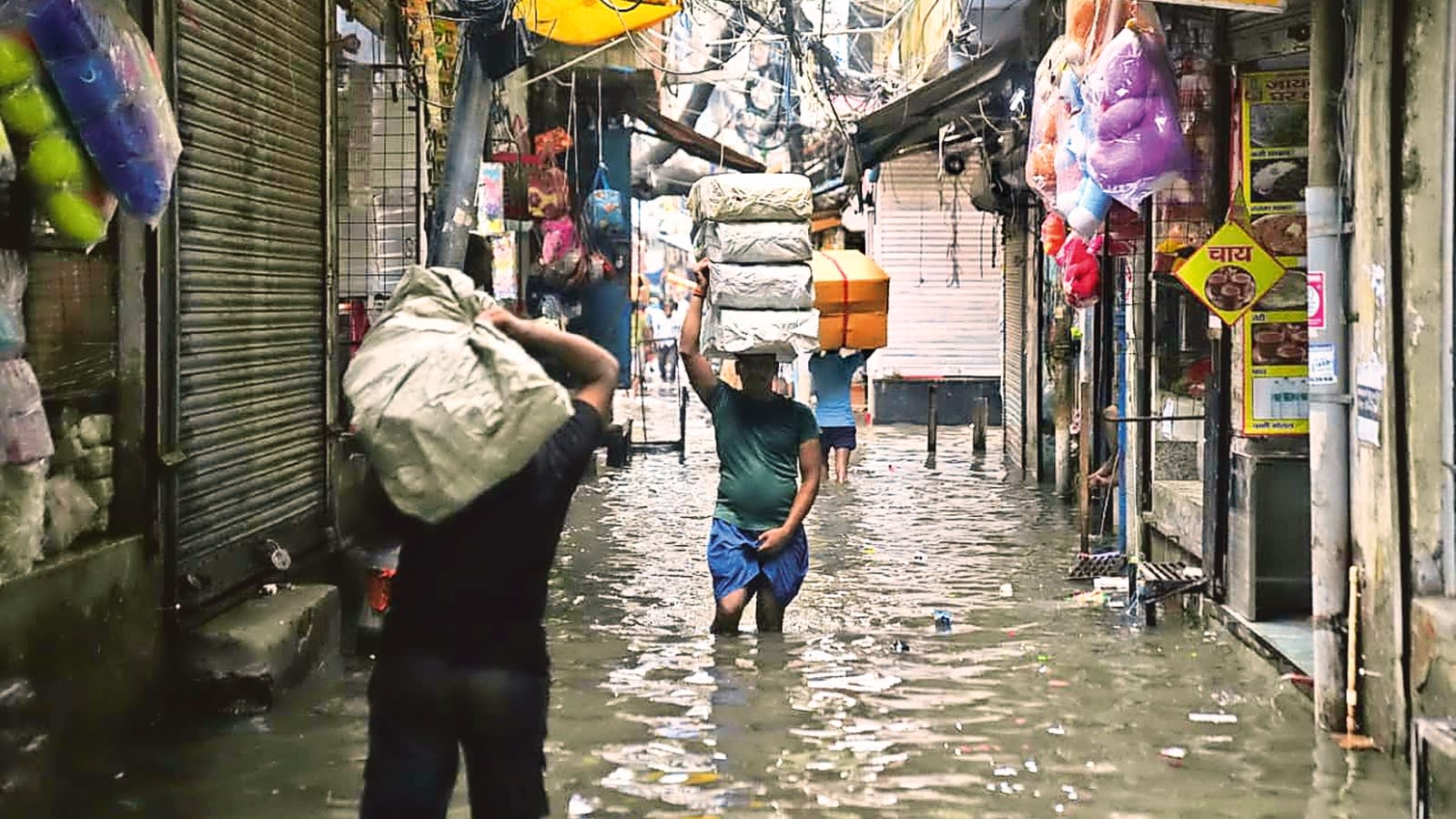 In Delhi’s wholesale hub Sadar, choked drains and water inside shops
