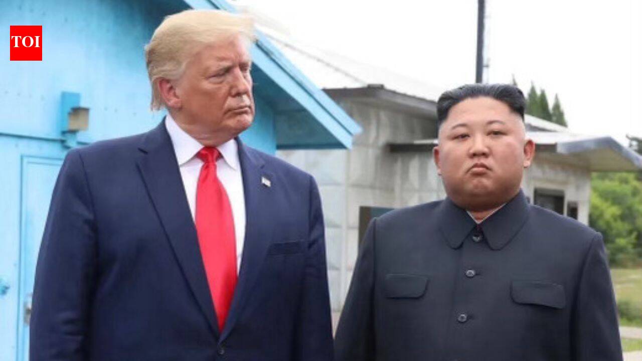 'Unfriendly look, but we get along great': Trump posts old photo with Kim Jong Un