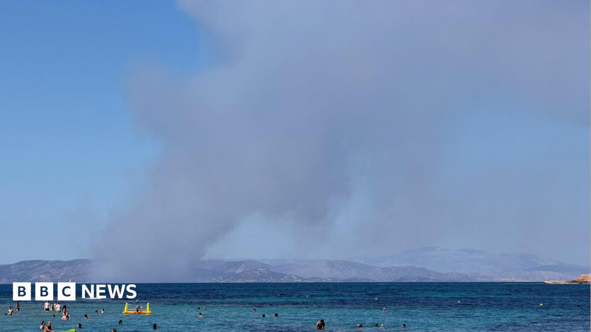 Two dead and evacuation under way as fires break out on Greek island