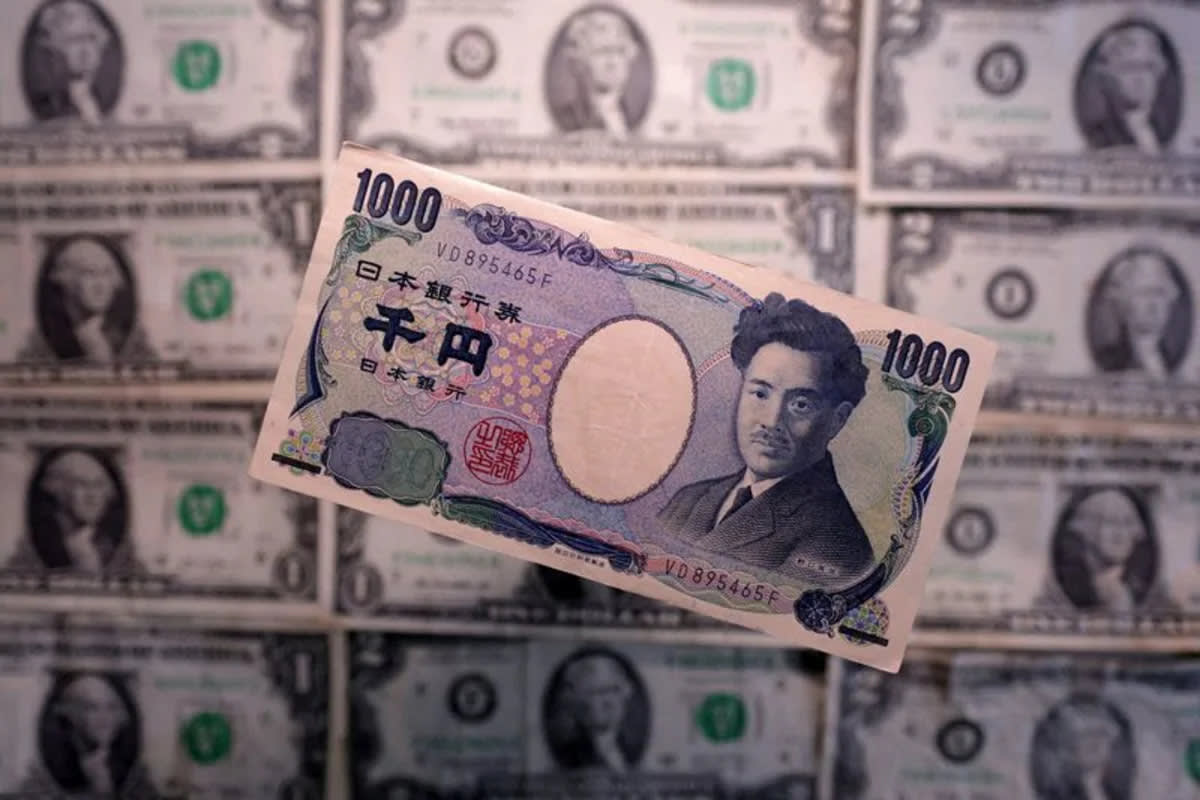 Dollar falls to lowest since early June as rate hike bets fade