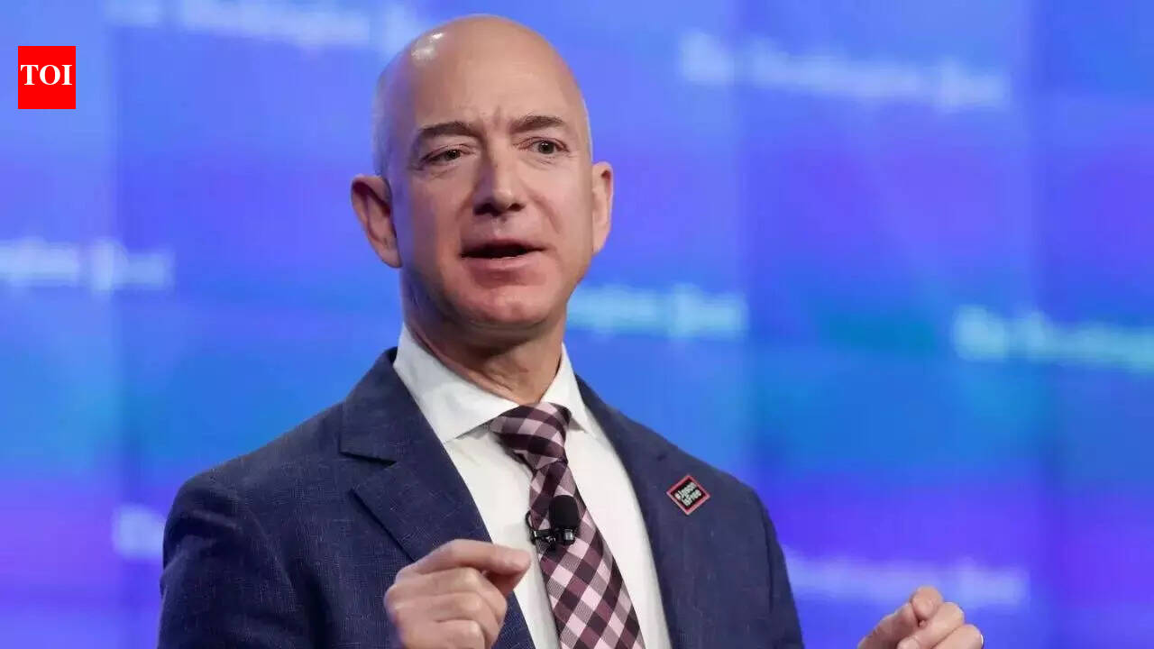 Jeff Bezos makes sports debut with consortium taking nearly 40% of Liverpool