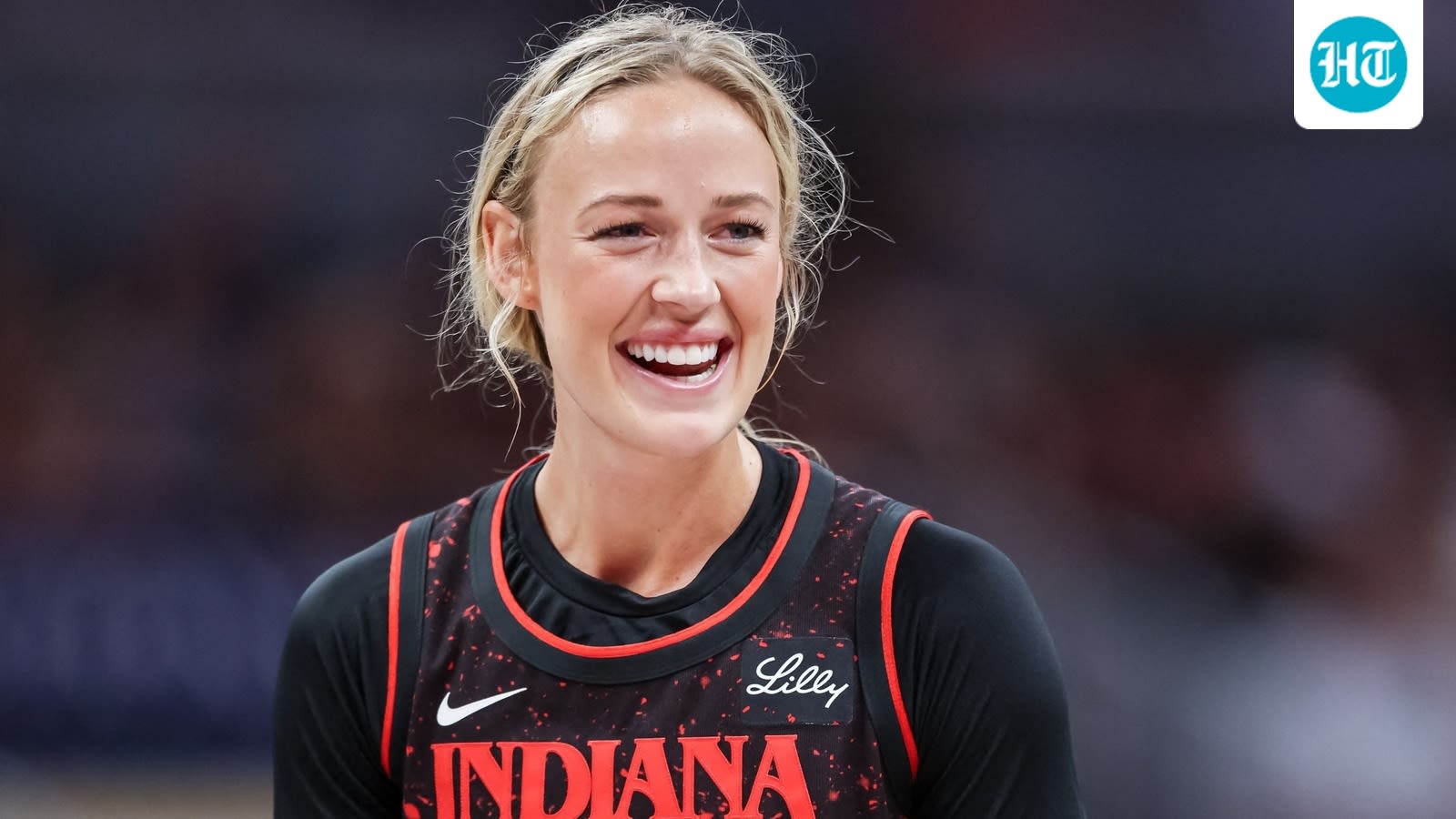 Sophie Cunningham supporters rally outside Liberty-Fever game with 'Save Women's Sports' signs