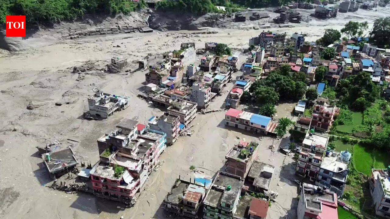 Nepal floods: Terrifying videos show homes, buildings and bridges swallowed by raging waters