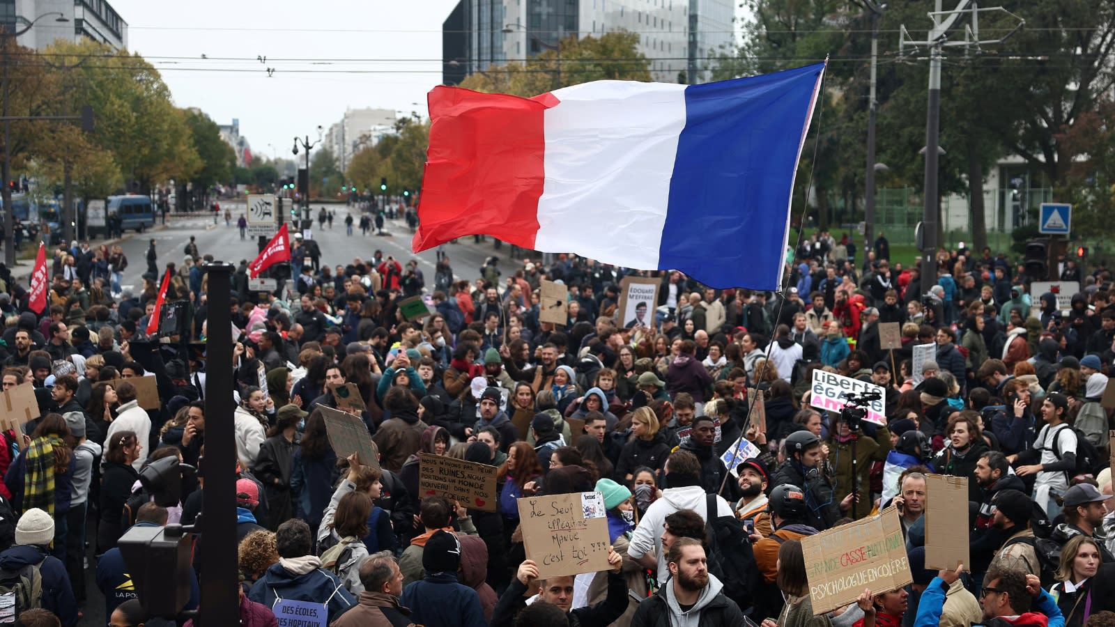 France deploys 70,000 officers as police fire tear gas at fresh protests over living costs