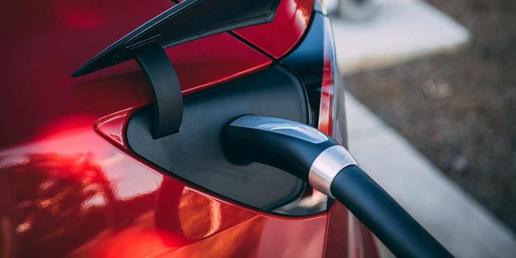 Replace a gas car with an electric
