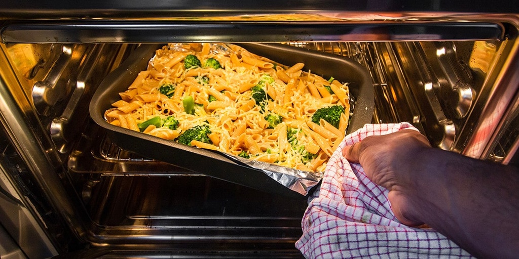 Use reusable baking sheets