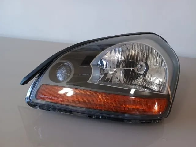 FAROL HYUNDAI TUCSON 2009/2016 LADO ESQUERDO Original