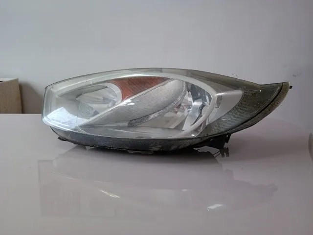 FAROL FORD FIESTA 2011/2014 LADO ESQUERDO