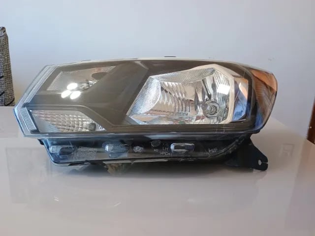 FAROL VOLKSWAGEN GOL VOYAGE SAVEIRO 2017/2023 LADO ESQUERDO Original