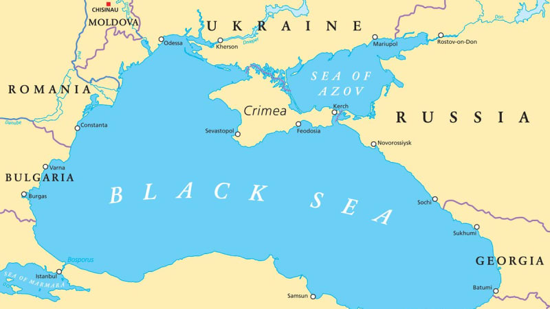 A political map of the Black Sea region showing surrounding countries including Ukraine, Russia, Turkey, Georgia, Bulgaria, Romania, and Moldova, with major cities and the Sea of Azov labeled.