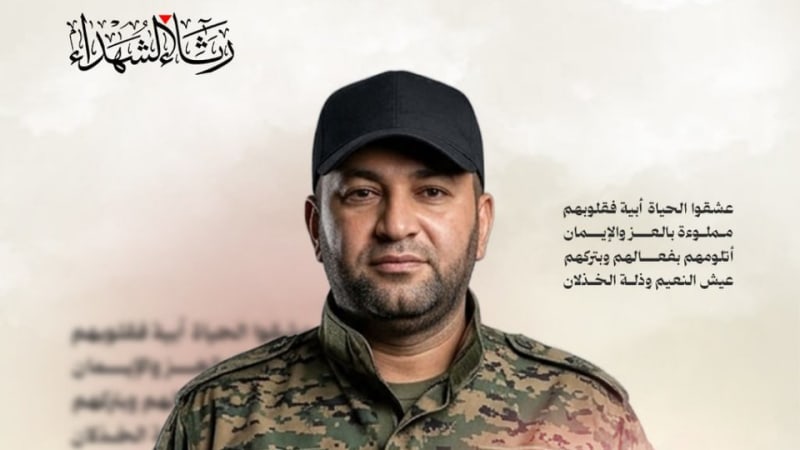 A martyrdom poster featuring a man in military camouflage uniform and black cap, with the Dome of the Rock in the background and Arabic text identifying him as Muhammad Abd al-Salam al-Yazouri, described as the Khan Younis brigade commander in the Al-Qassam Brigades.