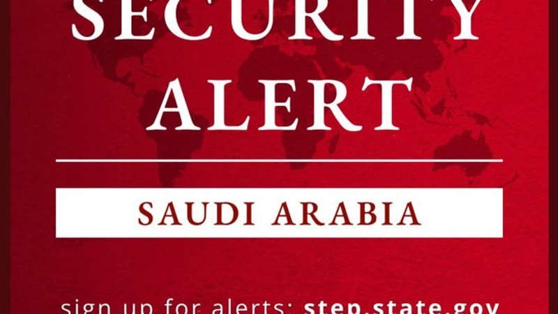 U.S. State Department security alert graphic for Saudi Arabia, featuring the American flag, State Department seal, and a link to step.state.gov on a red background.