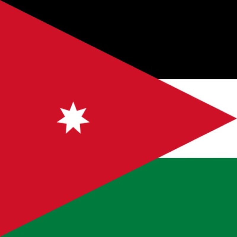 The national flag of Jordan, featuring horizontal black, white, and green stripes with a red chevron triangle on the hoist side containing a white seven-pointed star.
