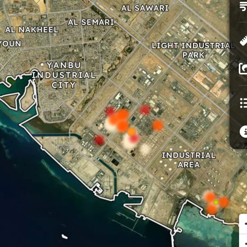 Satellite map view of Yanbu Industrial City in Saudi Arabia showing labeled districts including Al Sawari, Al Semari, Al Nakheel, Light Industrial Park, and Industrial Area, with heat map overlay markers indicating activity or incidents.