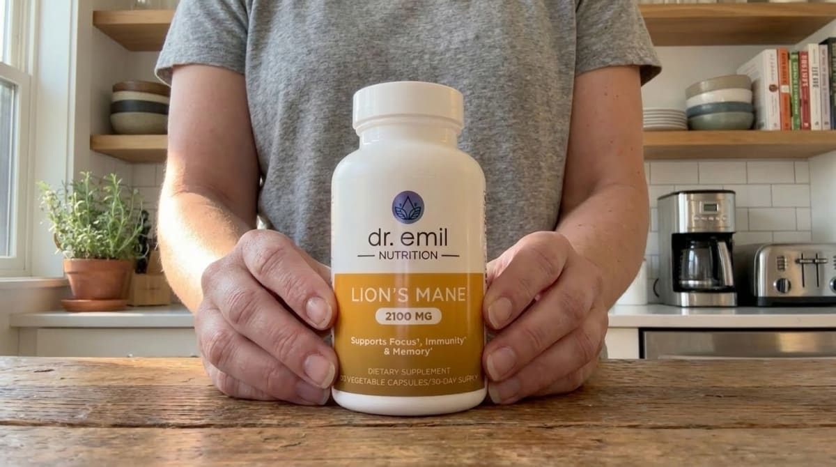 Host Defense Lion's Mane green capsule bottle on a wooden surface