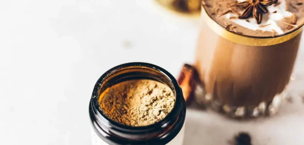 Cordyceps mushroom powder alongside coffee beans