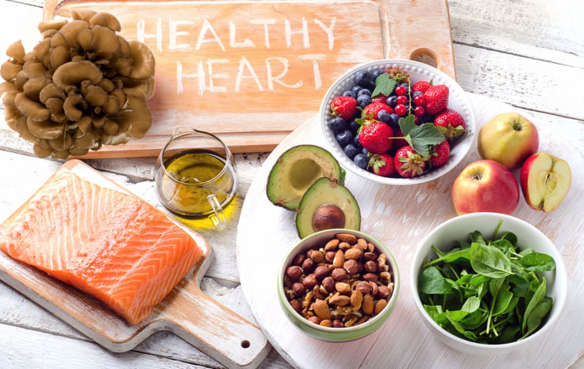 Maitake mushroom growing wild at the base of an oak tree