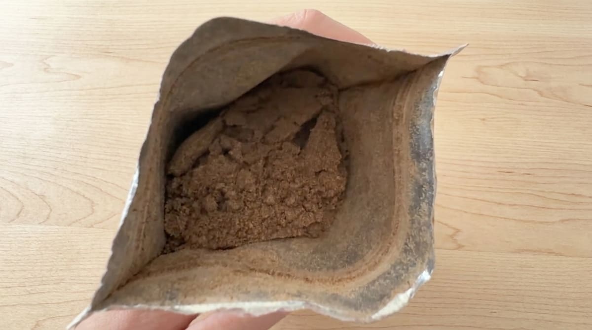 Close-up of Four Sigmatic mushroom coffee grounds showing texture and color