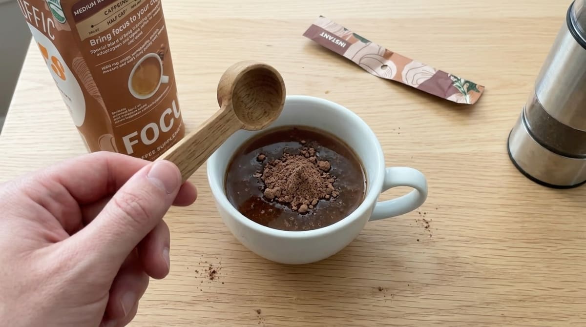Side-by-side comparison of Three mugs of brewed coffee from different brands for blind tasting