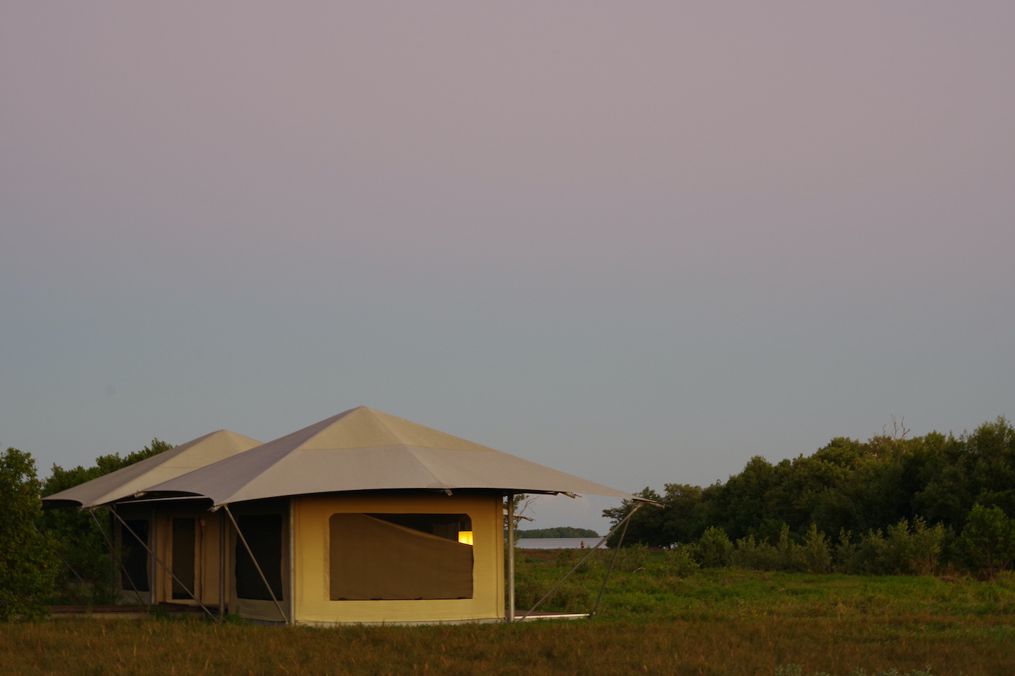 Everglades Glamping tents at sunset