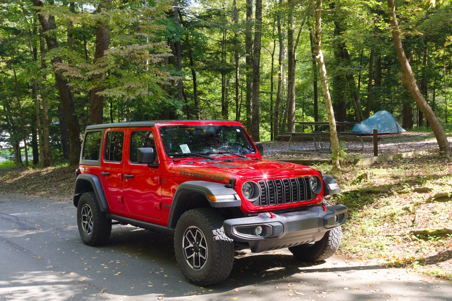 My travel companions in the Smokies: the rented 4x4 and my tent pitched in the background.