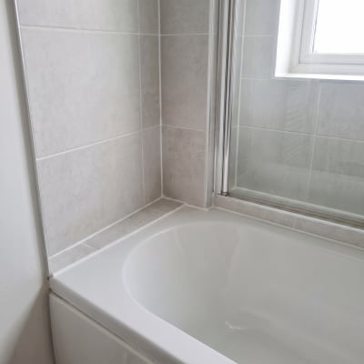 The same grout and silicone after cleaning