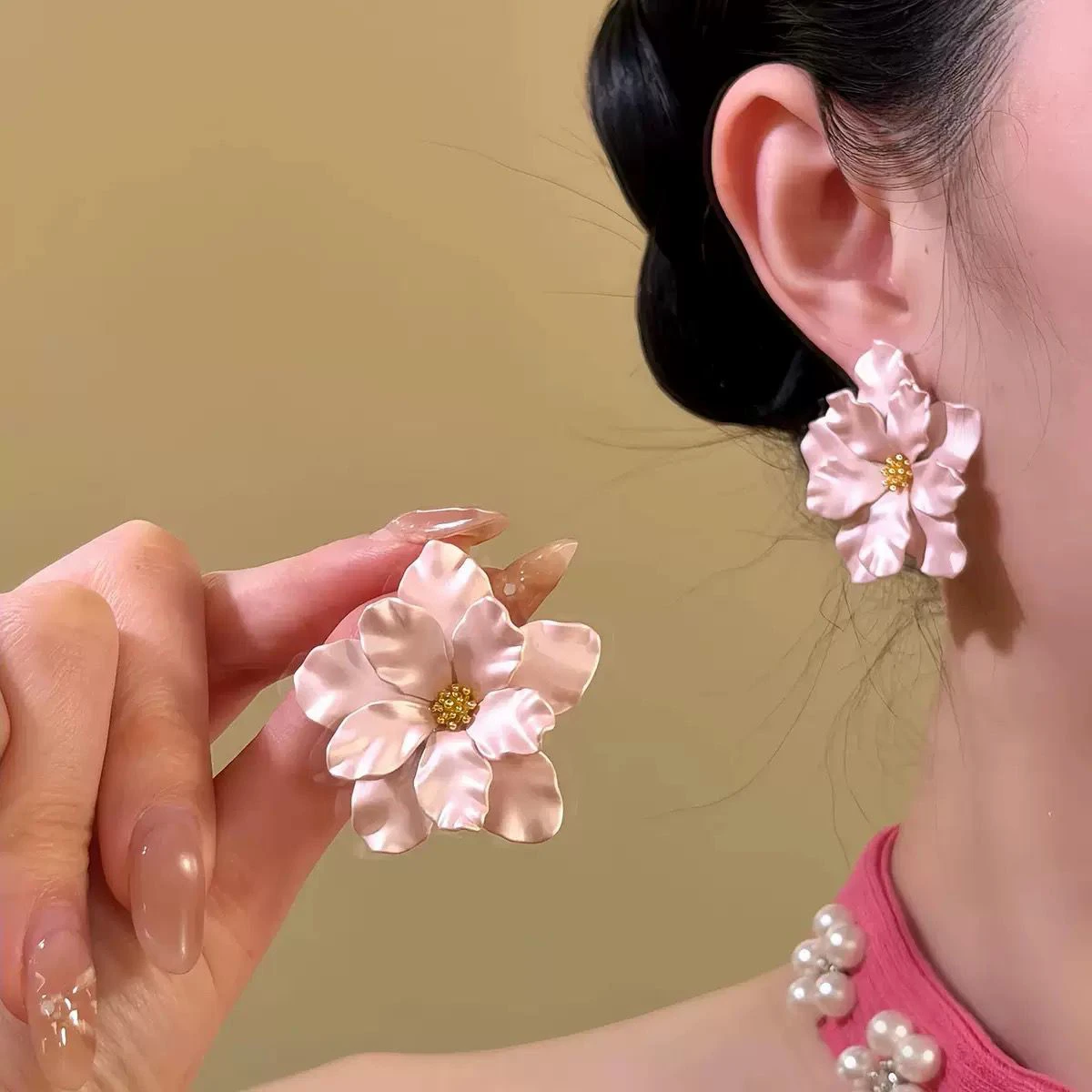 Chanel-inspired, subtly luxurious camellia-patterned earrings