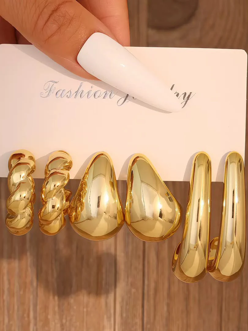 gold-toned hoop earrings thumbnail