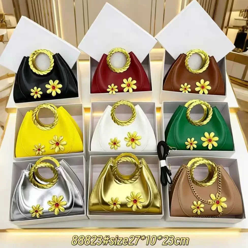 Metal ring cloud handbag