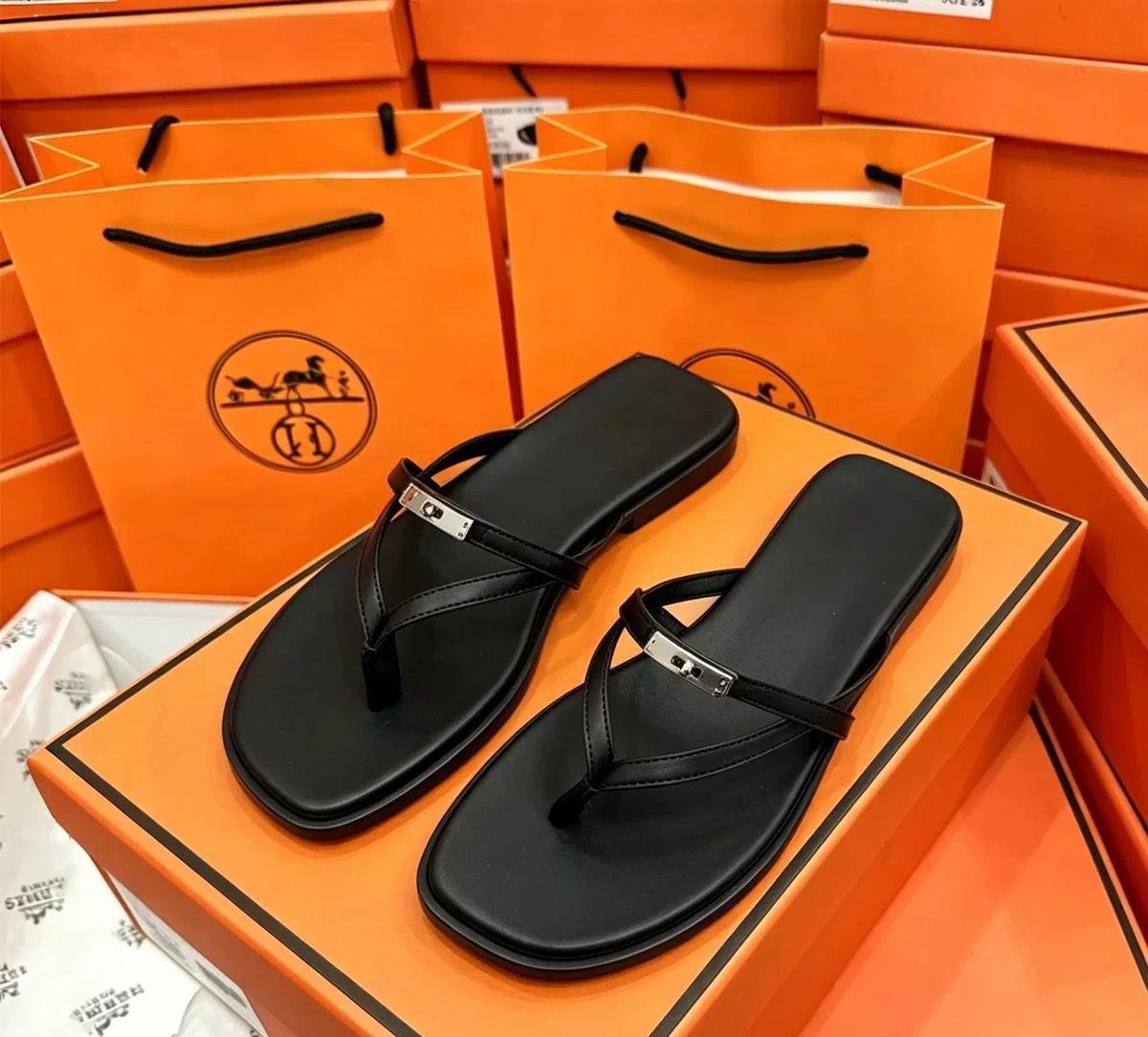 Flat flip flops with metal buckle thumbnail