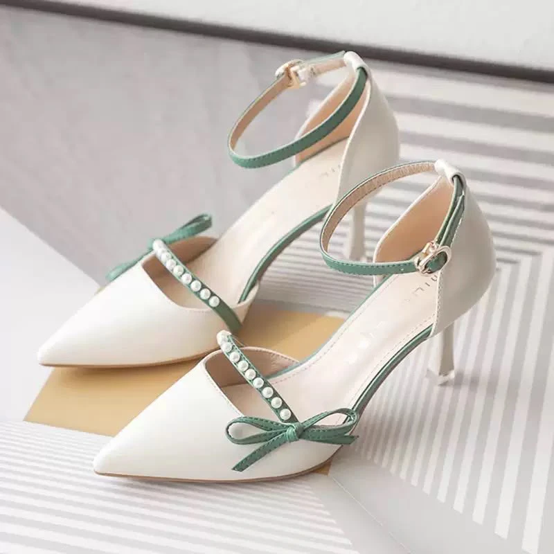 Single strap heels with pearl embellishments