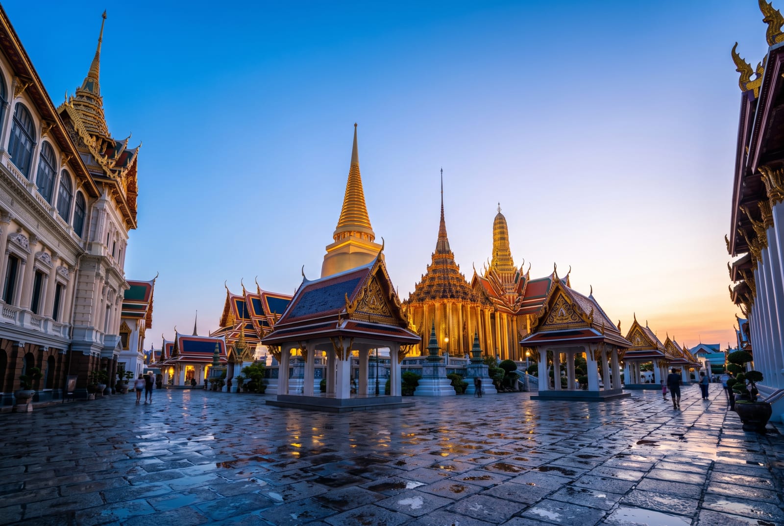 Grand Palace & Wat Phra Kaew, Bangkok — golden spires at blue hour